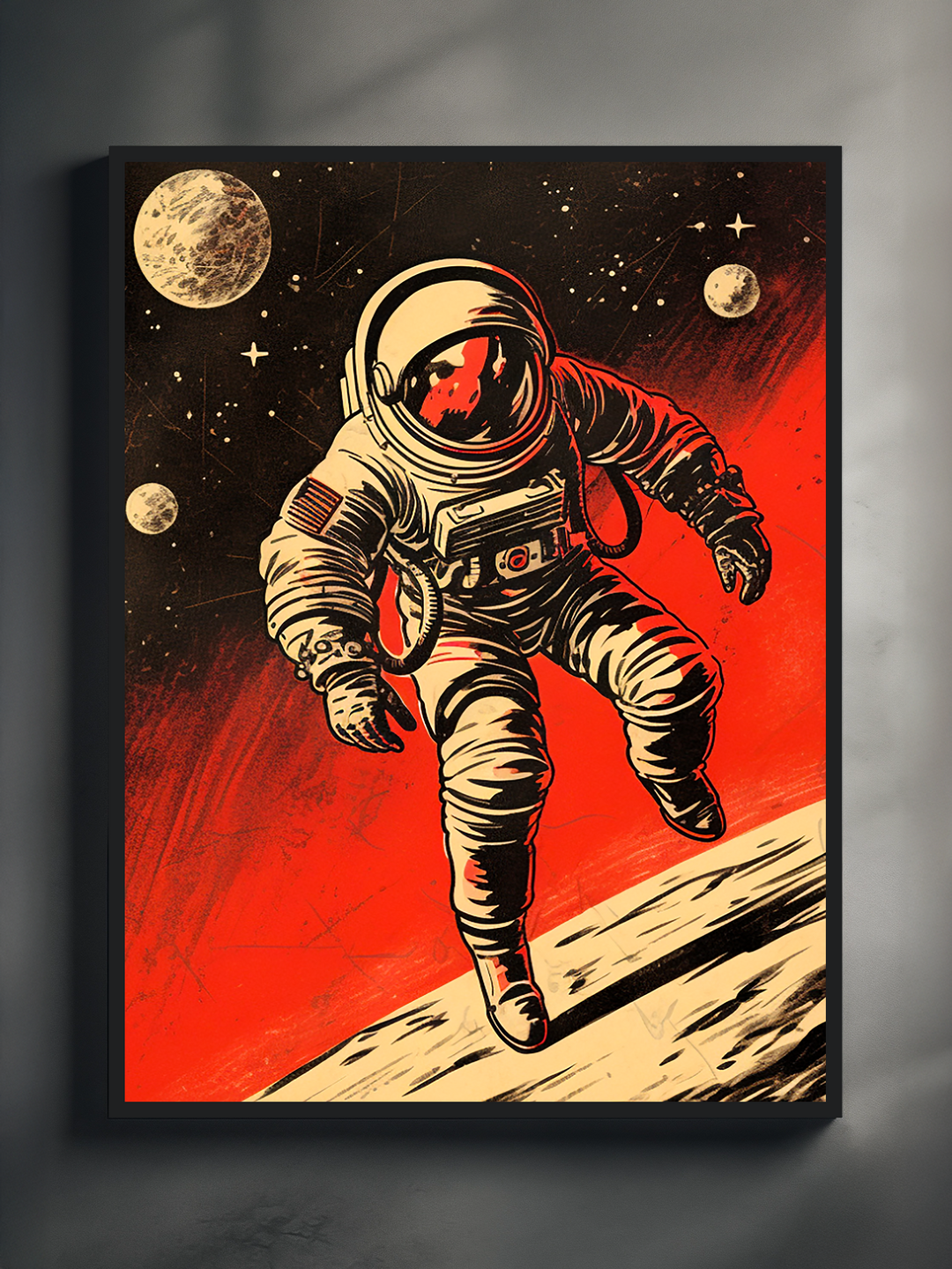 A framed poster depicting a lone astronaut floating above a moon-like surface, set against a dramatic red and black space backdrop with stars and planets. The illustration combines bold lines and vintage comic-style shading. Mounted on a light-colored wall, the artwork creates a striking focal point with its retro-futuristic design and intense cosmic atmosphere.
