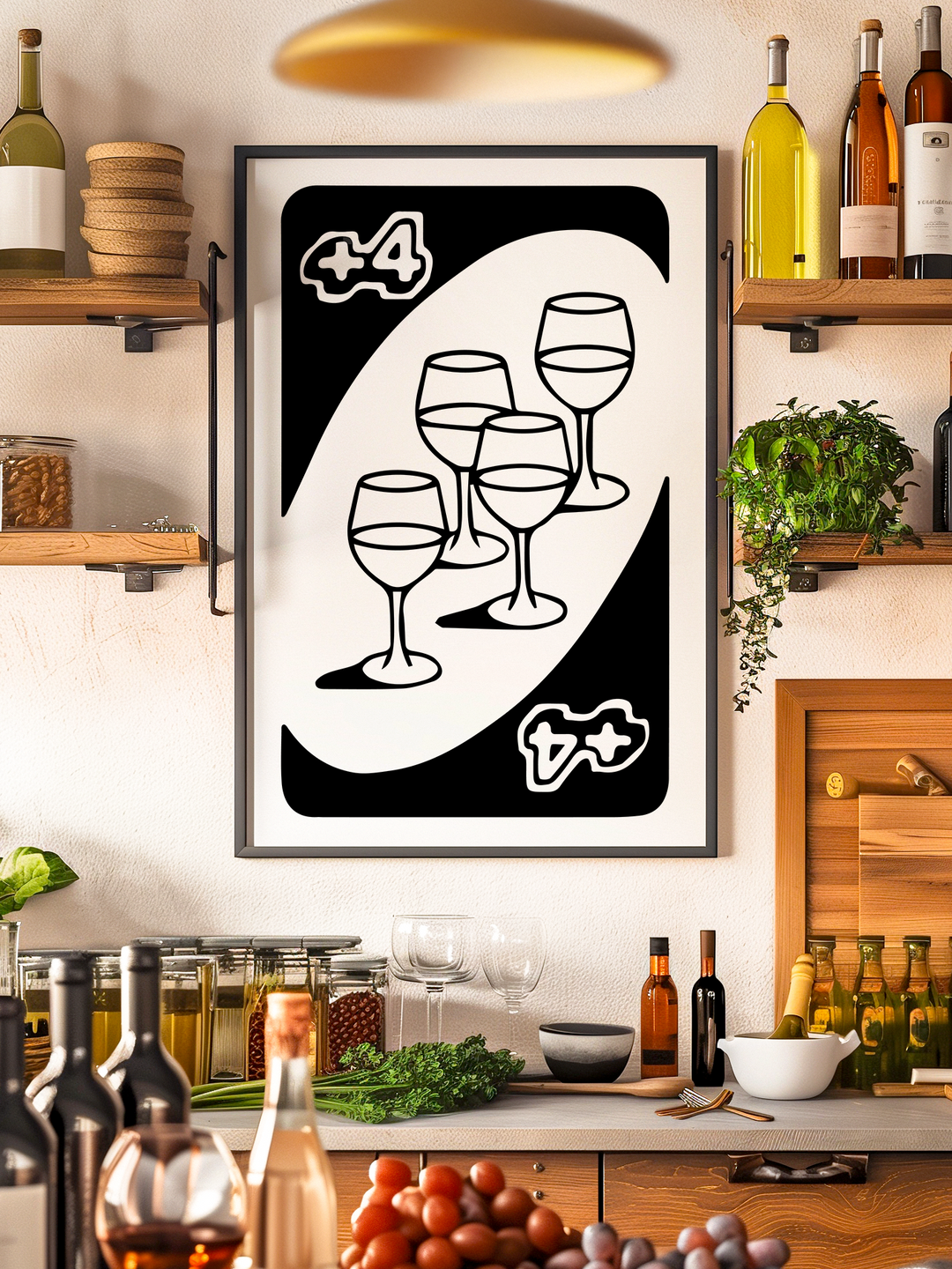 A black-and-white UNO card style poster with a +4 symbol and four wine glass illustrations, framed in black, hanging on the wall of a modern kitchen. The space features wooden shelves with wine bottles, herbs, and kitchen decor, creating a warm and inviting atmosphere.