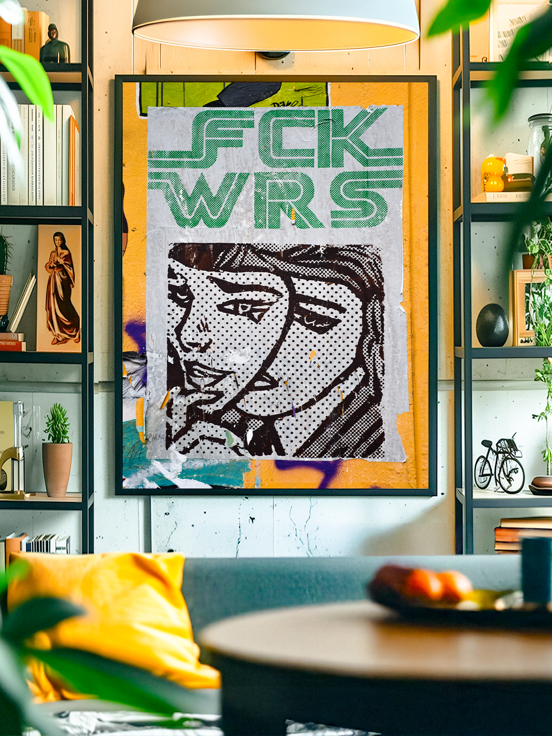 Contemporary street art poster featuring a striking black and white face illustration combined with bold green typography reading “FCK WRS”. Displayed in a modern living room setting with bookshelves, plants, and a cozy sofa, this artwork blends urban edge with stylish interior design.