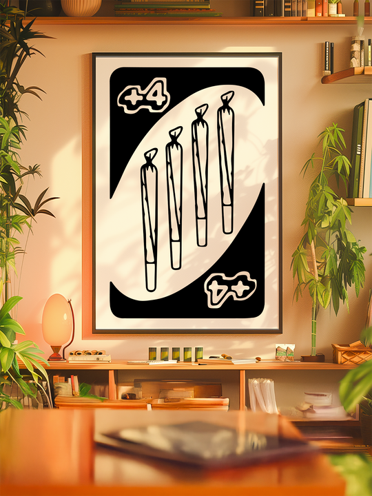 A cannabis-themed art poster depicting a black-and-white UNO card design with a +4 symbol and four illustrated joints, framed in black, hanging in a warm, cozy room decorated with indoor plants, wooden shelves, books, and soft ambient lighting.