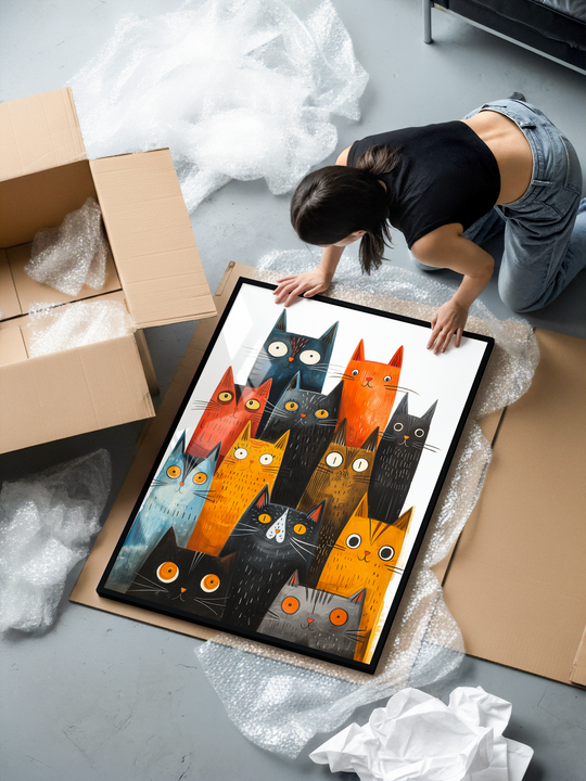 High quality framed wall art featuring a colorful group of whimsical cats illustrated in a playful modern style with textured details, vibrant tones, and expressive character design printed on museum grade matte paper and set in a sleek premium black metal frame for contemporary home décor.