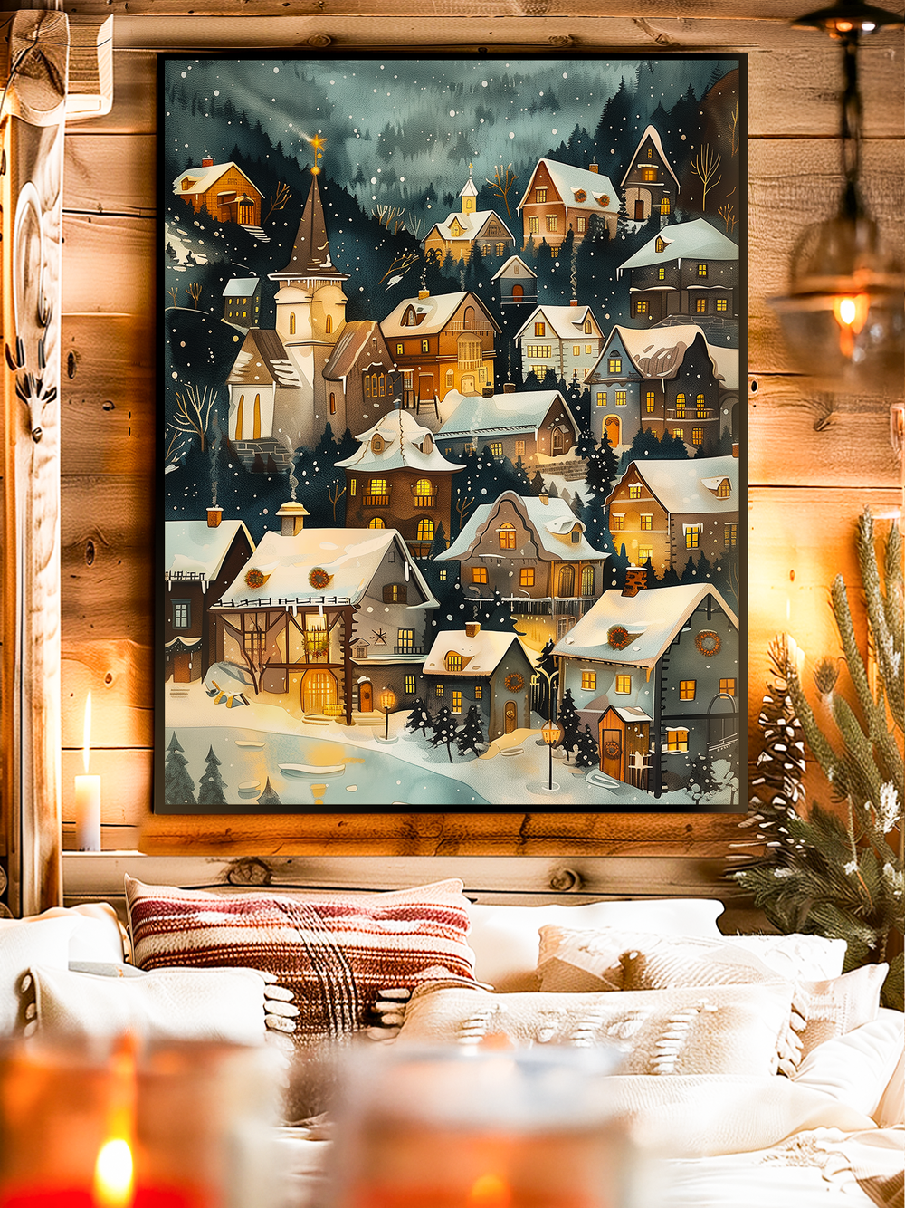 A charming winter village wall art poster showing snow-covered houses, a glowing church tower, and warmly lit windows against a dark forest backdrop. The artwork captures a festive holiday spirit with a cozy, nostalgic atmosphere. Displayed in a rustic wooden interior with candles, soft cushions, and pine decorations, it creates the perfect warm and inviting seasonal mood.
