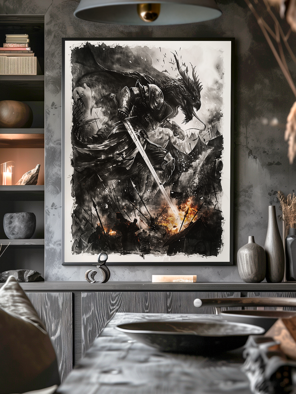 A dramatic monochrome fantasy poster showing a heavily armored warrior with a sword facing a roaring dragon. The scene is full of motion, with sparks and flames illuminating the dark, smoky background. Displayed in a modern room with gray textured walls, shelves with pottery and books, and a sleek table in the foreground.