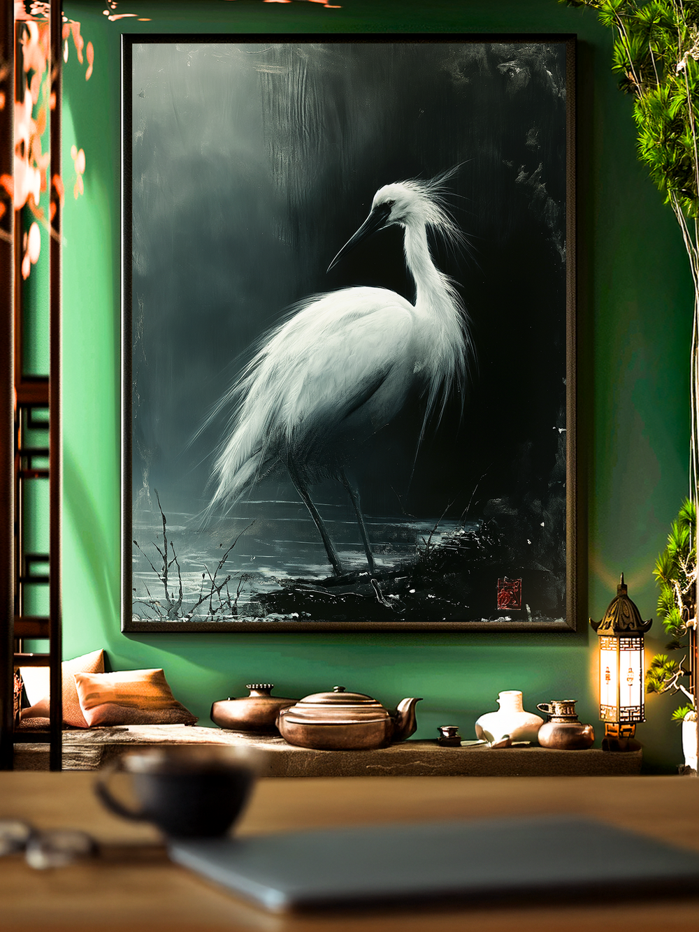 A refined wall art print of a white crane standing gracefully against a dark misty background, styled in traditional Japanese ink-painting aesthetics. Displayed in a serene green-walled room with bonsai plants, tea sets, and a lantern, the artwork enhances the tranquil zen-inspired atmosphere.