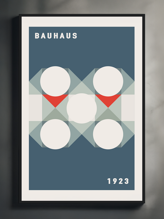A framed Bauhaus-style artwork displayed against a dark wall, featuring a grid of white circles with intersecting translucent triangles and red accents. The design is minimal and structured, with the word “Bauhaus” at the top left and the year “1923” at the bottom right, set on a deep blue background.
