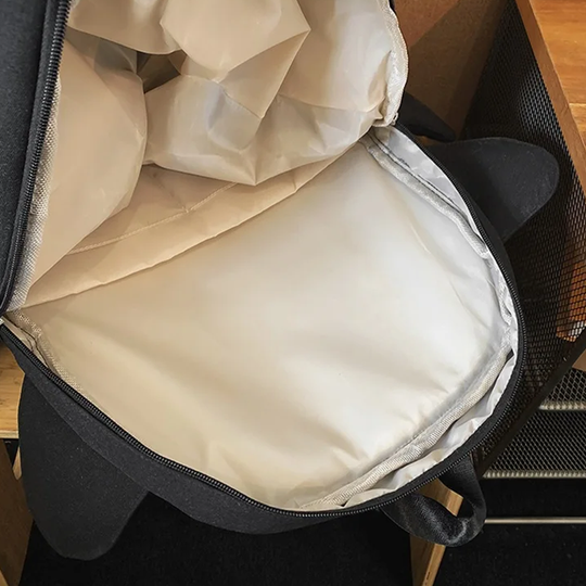 AconaStudio Dino Utility Backpack – sculpted dinosaur silhouette