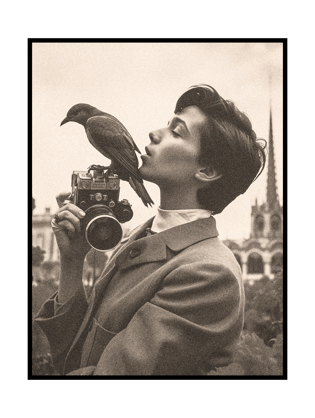 Timeless black and white vintage photograph showing a man holding a classic film camera while a small bird rests gently on top. The soft grain, nostalgic tones, and candid moment evoke mid-century street photography, poetic intimacy, and old-fashioned visual storytelling.